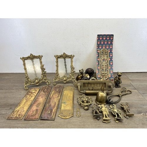 417 - A collection of 19th century and later metalware to include brass letterbox, pair of Rococo style br... 