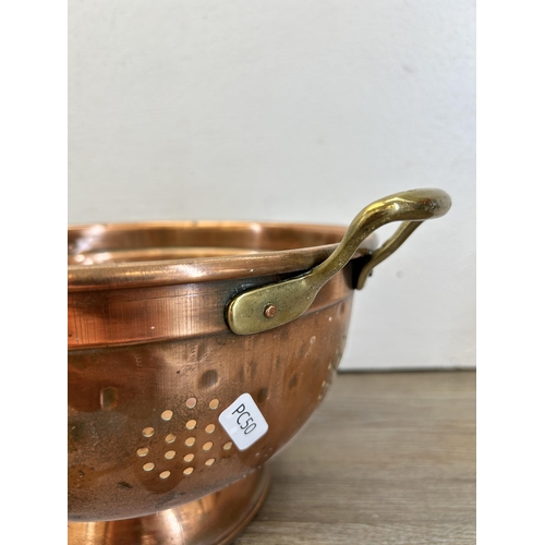 418 - Five pieces of late 19th/early 20th century copper kitchenware, one colander and four graduating sau... 