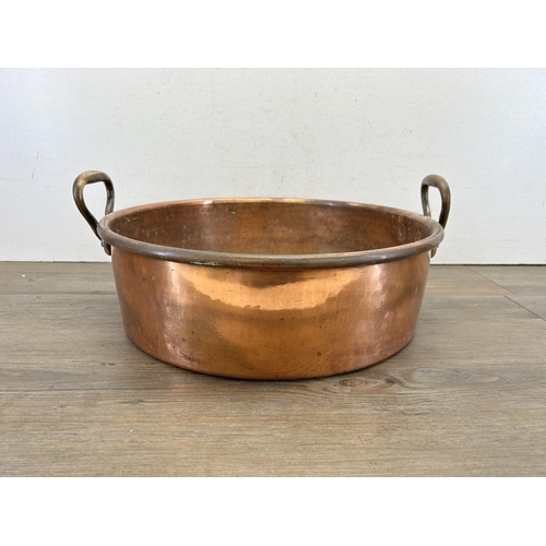 419 - A large Victorian copper twin handled preserve pan - approx. 20cm high x 43cm diameter