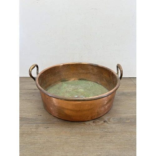 419 - A large Victorian copper twin handled preserve pan - approx. 20cm high x 43cm diameter