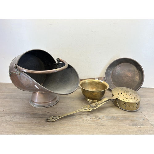 420 - Four pieces of 19th century and later metalware to include copper helmet coal scuttle, Chinese engra... 