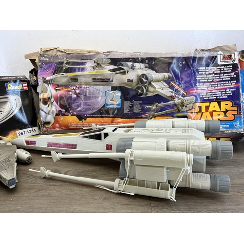 455 - A collection of vintage boxed Star Wars and Star Trek models to include Revell U.S.S. Voyager buildi... 