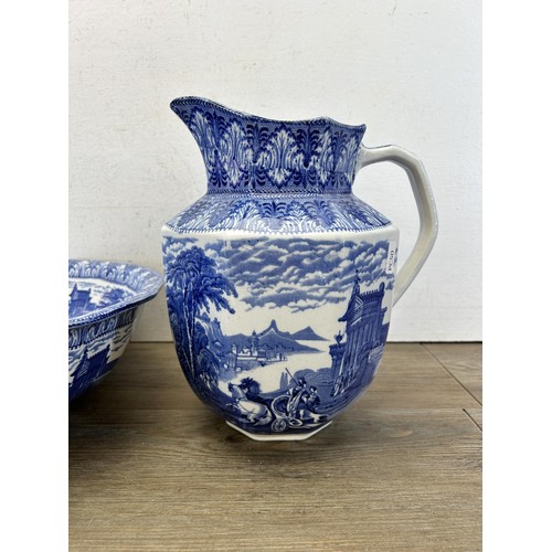 366A - An antique Cauldon England blue and white transfer printed water jug and bowl with horse and chariot... 