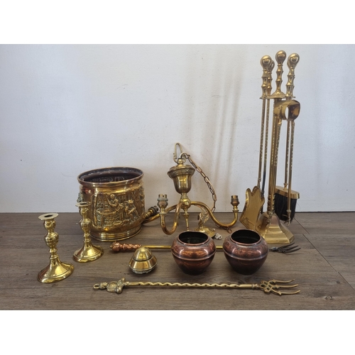 430 - A collection of metalware to include embossed brass coal bucket, brass three branch chandelier, six ... 