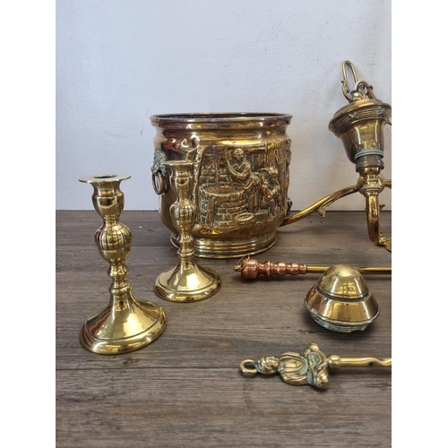 430 - A collection of metalware to include embossed brass coal bucket, brass three branch chandelier, six ... 