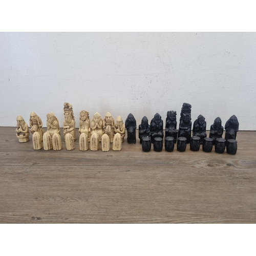 439 - An Isle of Lewis design resin chess piece set