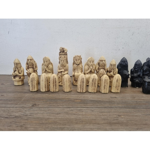 439 - An Isle of Lewis design resin chess piece set