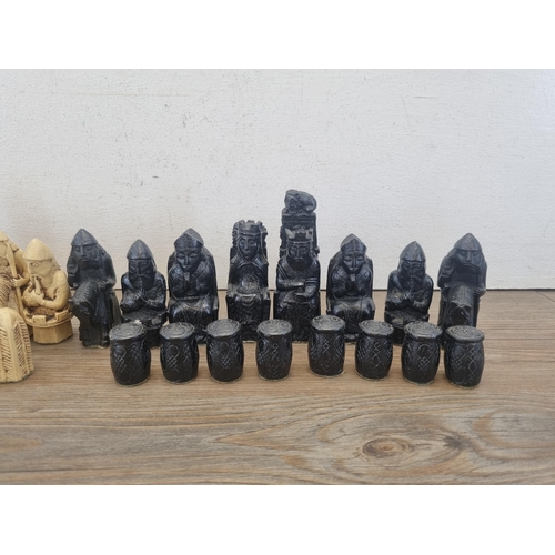 439 - An Isle of Lewis design resin chess piece set