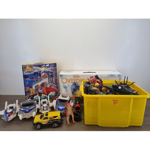 442 - A large collection of action figurines and model vehicles to include Hasbro Tonka Racing Hornet, Mar... 