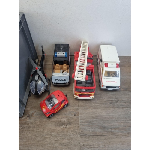 444 - A collection of Lego and model vehicles to include Playmobil ambulance, police car and fire truck et... 