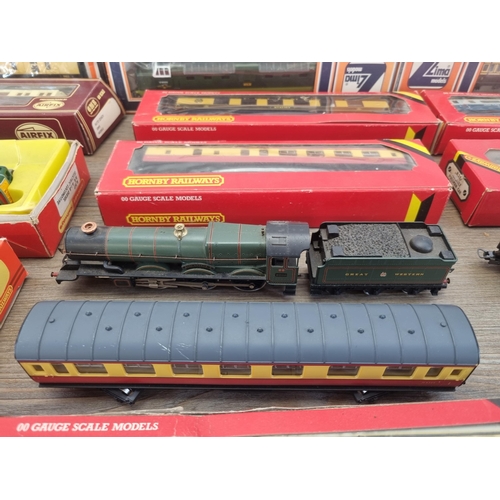 445 - A collection of mostly boxed OO/HO model railway to include Hornby R.438 B.R. brake coach, Hornby R.... 