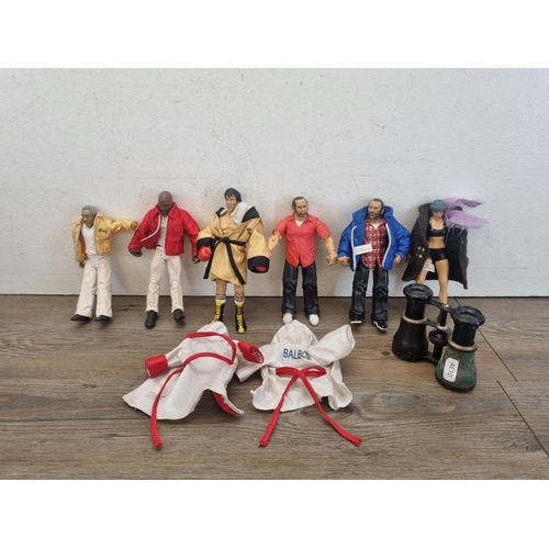 446 - A collection of MGM Studios Jakks Pacific Inc. Rocky action figures to include Rocky, Paulie, Micky ... 