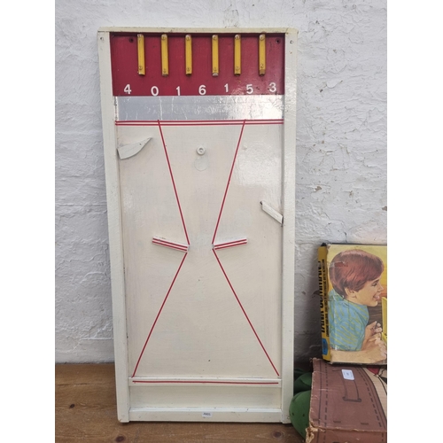 453 - A collection of vintage games to include boxed Marx Pro Shot Golf putting set, boxed Ideal Tank Comm... 