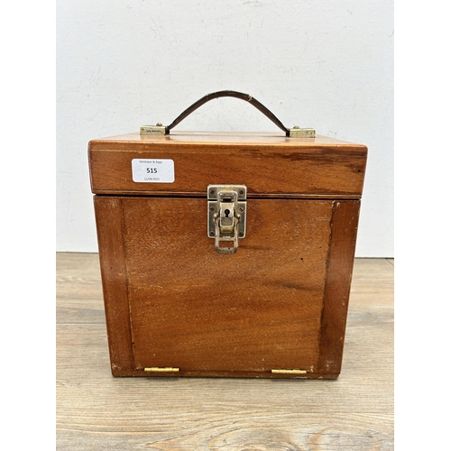 515 - A vintage Cheney oak drop front storage box with key - approx. 26cm high x 25cm wide x 23cm deep