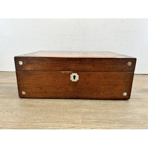 521 - A 19th century rosewood and mother of pearl inlaid work box - approx. 12cm high x 30cm wide x 22.5cm... 