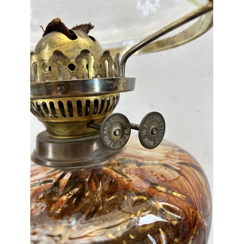 531 - An early 20th century Duplex brass oil lamp with glass reservoir and shade - approx. 56cm high