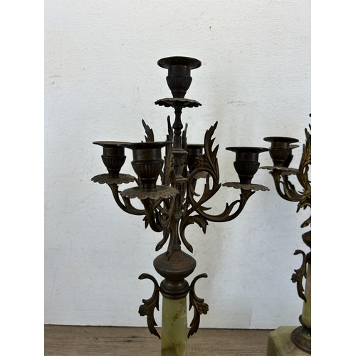 535 - A pair of 19th century style gilt metal and onyx four branch candelabras - approx. 46cm high