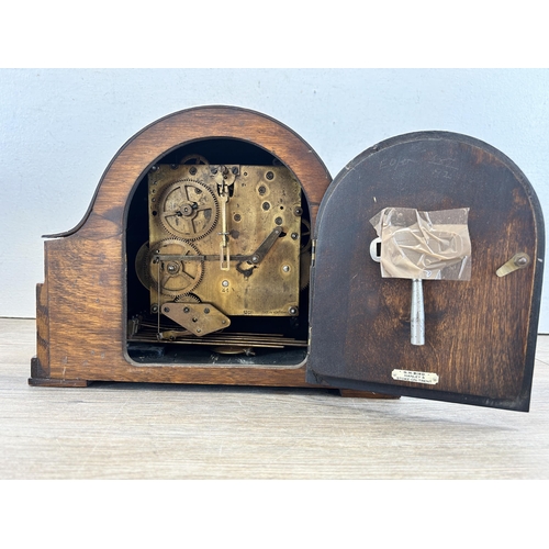 548 - A 1930s G.H. Bird of Hanley oak cased Westminster chime mantel clock with key - approx. 22cm high