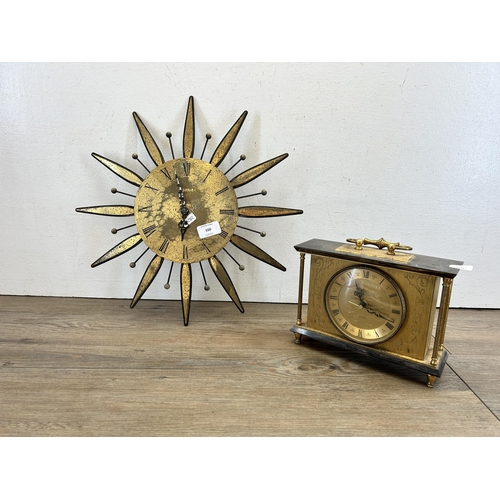 550 - Two mid 20th century clocks, one Kienzle brass sunburst and one Bentima quartz mantel