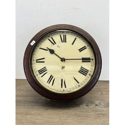 551 - An early 20th century mahogany cased circular wall clock with pendulum - approx. 38cm diameter