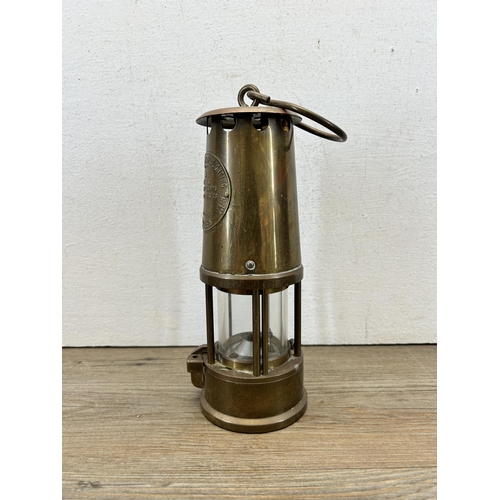 564 - An early 20th century The Protector Lamp & Lighting Co Ltd Type 6 brass miner's lamp - approx. 25cm ... 