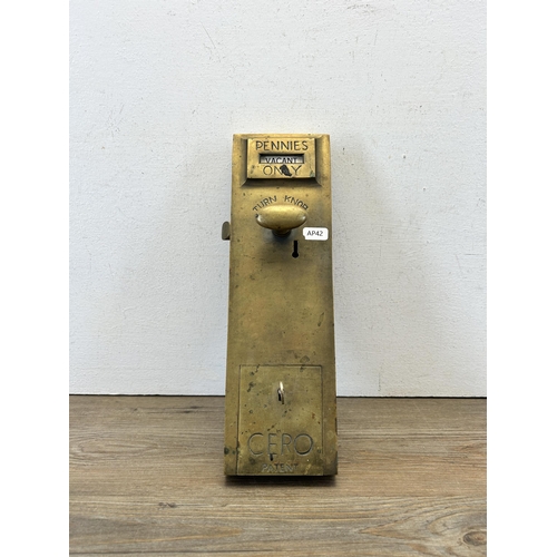 570 - An early 20th century Cero brass spend a penny toilet door lock with key