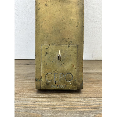 570 - An early 20th century Cero brass spend a penny toilet door lock with key