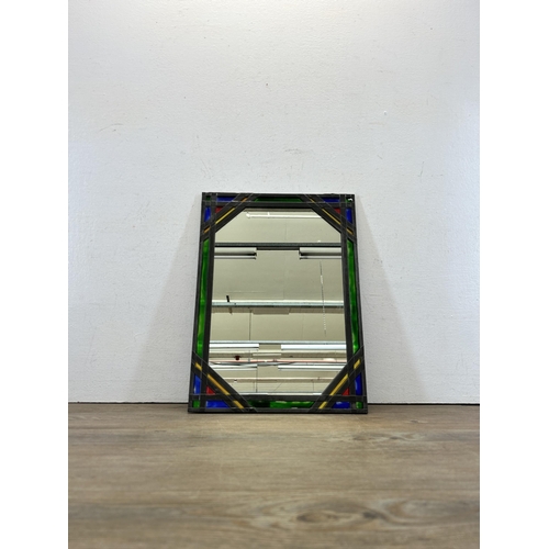 571 - An Art Deco style leaded stained glass mirror - approx. 38cm high x 28cm wide