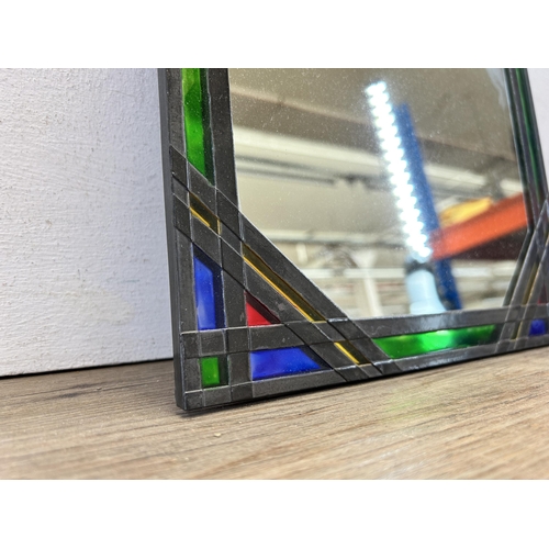 571 - An Art Deco style leaded stained glass mirror - approx. 38cm high x 28cm wide