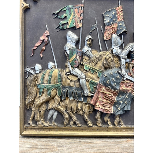 574 - A Marcus Designs Agincourt 1415 battle scene 3-D ceramic wall plaque featuring King Henry V - approx... 