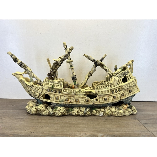 581 - A fibreglass aquarium model of a shipwreck - approx. 43cm high x 82cm long