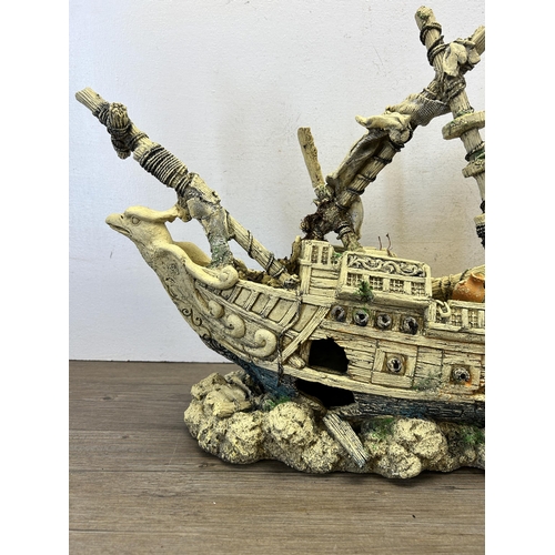 581 - A fibreglass aquarium model of a shipwreck - approx. 43cm high x 82cm long