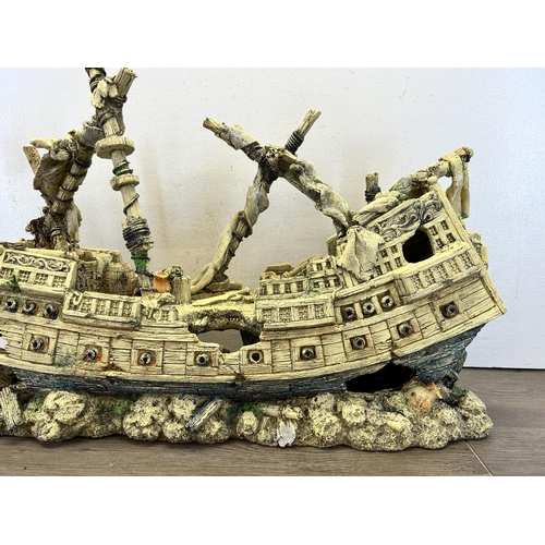 581 - A fibreglass aquarium model of a shipwreck - approx. 43cm high x 82cm long