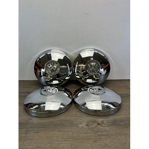 582 - A set of four VW chromium plated wheel hub caps