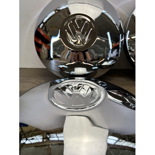 582 - A set of four VW chromium plated wheel hub caps