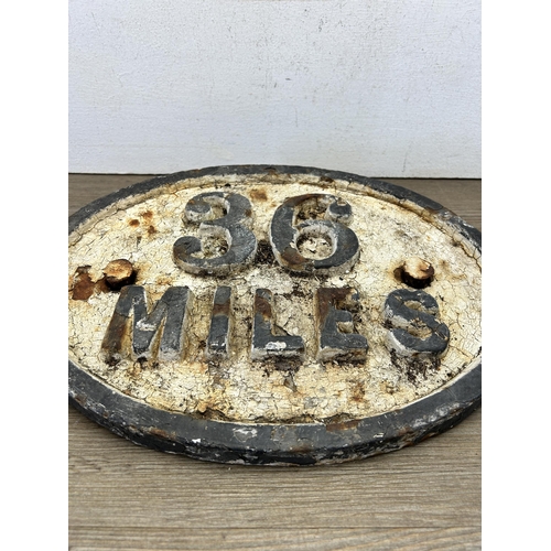 586 - An early 20th century cast iron railway 36 miles sign - approx. 28cm high x 37cm wide