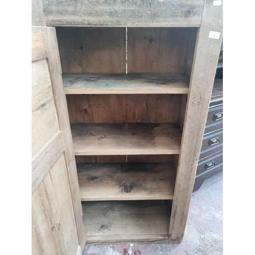 106 - A Victorian pine school cupboard - approx. 132cm high x 71cm wide x 35cm deep