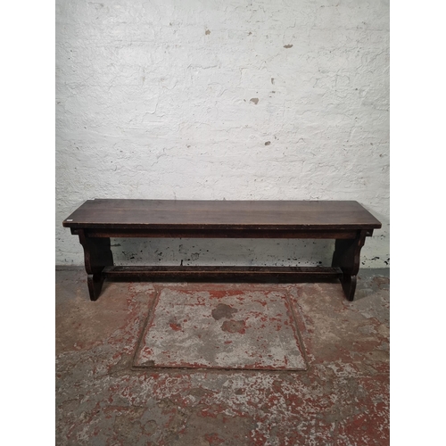 108 - A mid 20th century oak bench - approx. 46cm high x 35cm wide x 152cm long