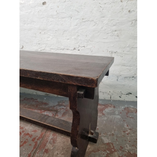 108 - A mid 20th century oak bench - approx. 46cm high x 35cm wide x 152cm long