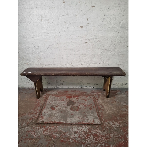 109 - An early 20th century pine bench - approx. 42cm high x 27cm wide 143cm long