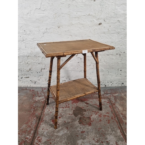 73 - A Victorian bamboo two tier side table