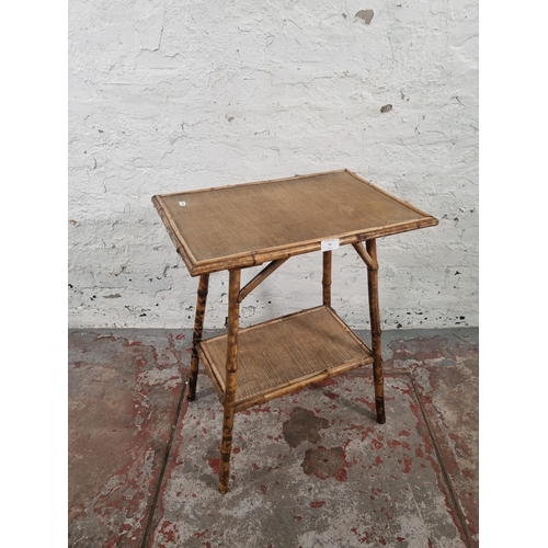 73 - A Victorian bamboo two tier side table