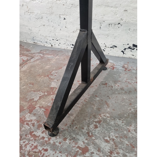 84 - A mid 20th century beech and black metal free standing school coat rack - approx. 125cm high x 154cm... 