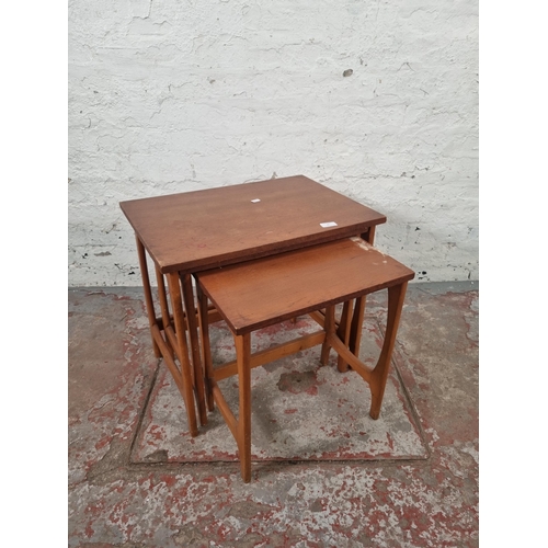 85 - A teak nest of three tables