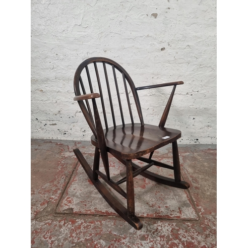 86 - An Ercol elm and beech rocking chair