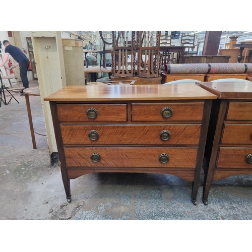 88 - A pair of Edwardian walnut chests of drawers