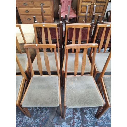 94 - Eight mid 20th century beech and brown fabric dining chairs