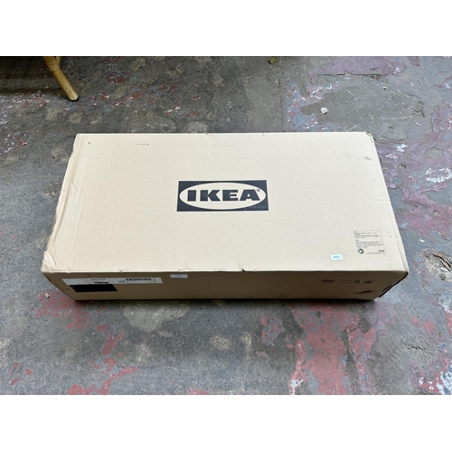 14 - A boxed IKEA Kallax 77cm x 77cm cube shelving unit