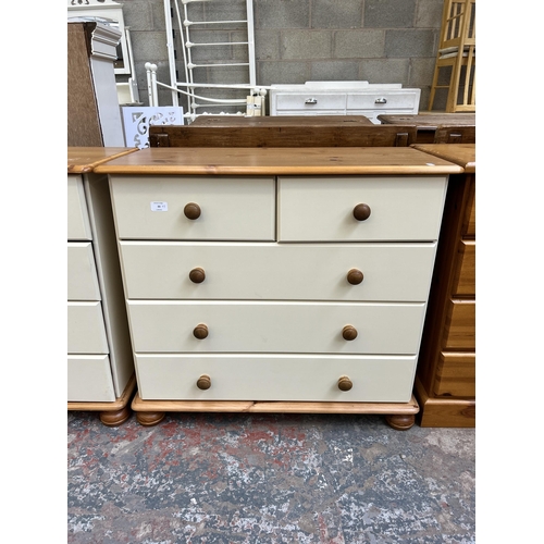 33 - A pine and white painted three piece bedroom suite comprising two chests of drawers - approx. 74cm h... 