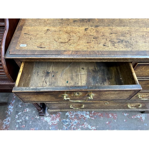 41 - A George III oak and mahogany crossbanded chest of two short over three long drawers with bracket su... 